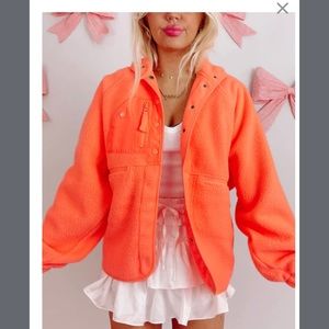 Neon orange fleece jacket, never worn, size medium, still has tag